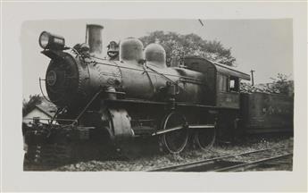 (TRAINS--PENNSYLVANIA RAILROAD) A binder assembled by the artist Lewis Smith with approximately 280 snapshots of steam locomotives.